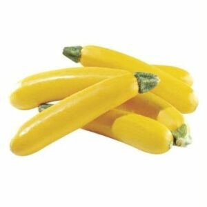 Several yellow zucchinis kept in a heap against a white background