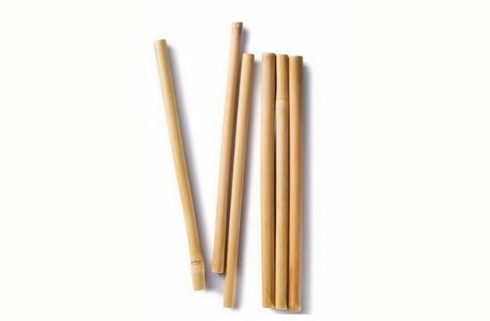 Natural Reusable Bamboo Straws kept against a light background