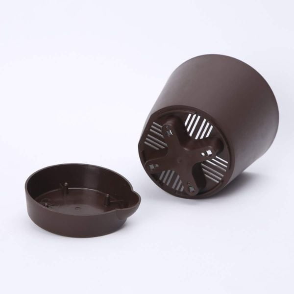 Image of a black pot with a detachable bottom.