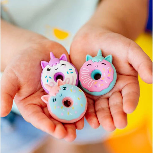 A hand Holding Unicorn Donut Rubber eraser